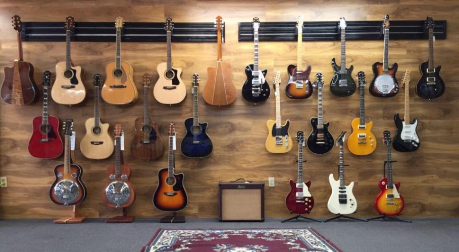 Electric and acoustic guitars at Family Music store in Louisville, KY